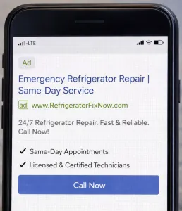 Example of a high-converting mobile text ad for emergency refrigerator repair services.