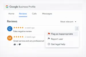 Screenshot of the Google Business Profile reviews tab showing the three-dot menu for flagging.