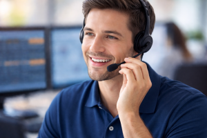 Close up of a customer service representative wearing a headset answering a dispatch call