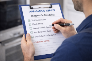 Hands holding a clipboard with an appliance repair diagnostic checklist
